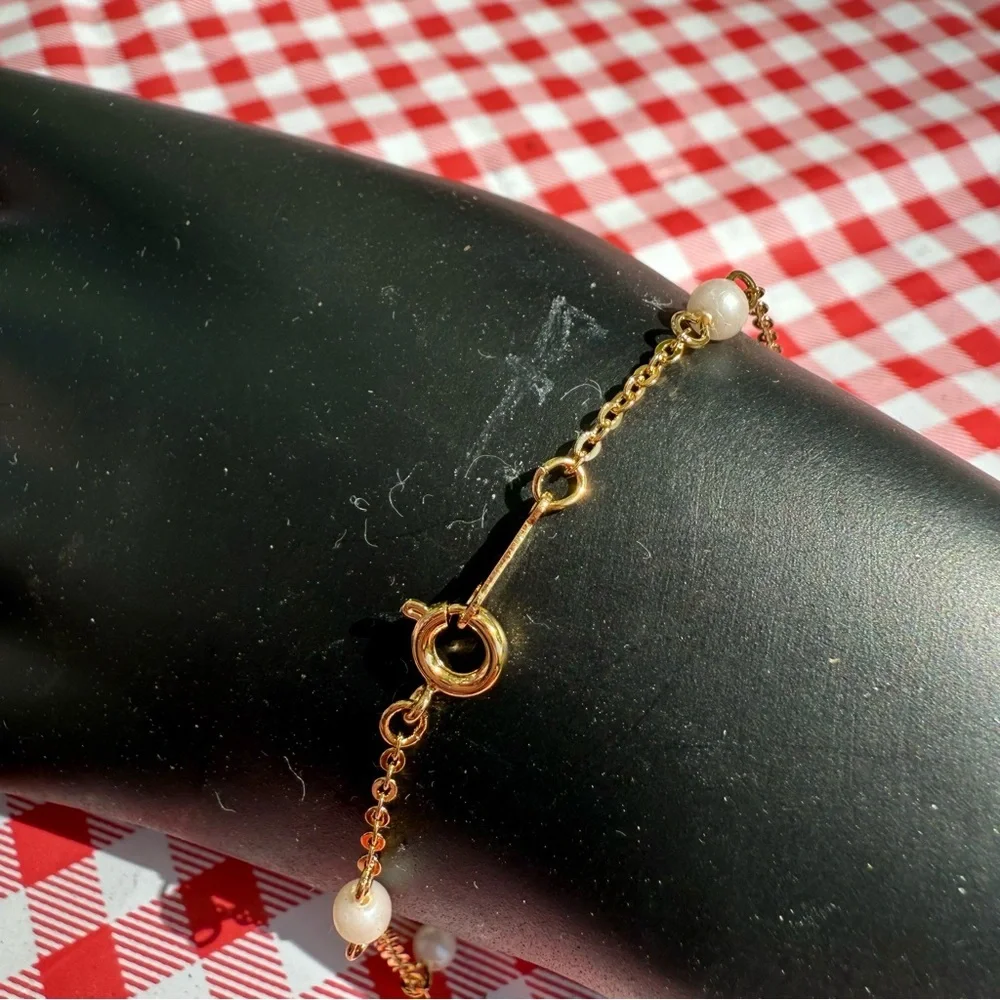 Avon “Glimmer Touch” bracelet  Gold and Crystal caged design vintage 1990 NIB